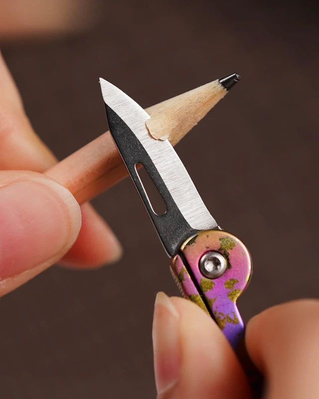 Alt view image 7 of 7 - KK05 Titanium Mini Pocket Knife, 1.06-Inch Blade, Graffiti Purple Lightweight EDC Knife for opening packages and snack wrappers, removing clothing tags, and handling everyday tasks