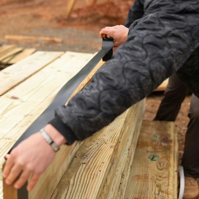 Alt view image 3 of 7 - Pro Grade Deck and Joist Flashing Tape - 4 Inch Width (3.78 in. x 50 ft) - All Weather & UV Resistant Linerless Tape for Decking, Wood, Beams with Advanced Acrylic Adhesive - 13 mils - Black