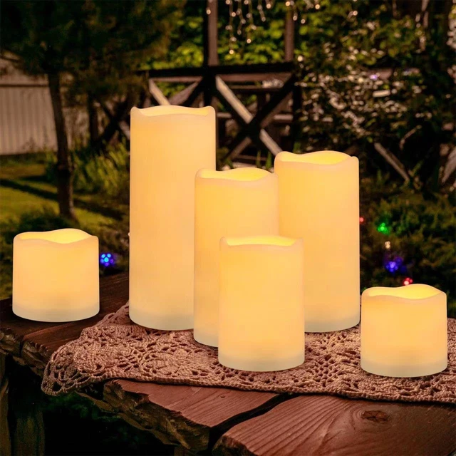 Alt view image 4 of 7 - Flameless Battery Operated Outdoor Waterproof Set of 12(D: 3" x H: 3" 4" 5" 6") Pillar LED Candles with 10-Key Remote and Cycling 24 Hours Timer