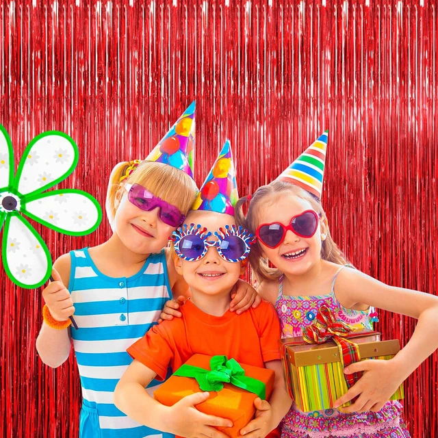 Alt view image 7 of 7 - Red Foil Fringe Curtain 10 Pack 3 x 8 Ft School Spirit Bold red metallic tinsel adds color impact while adhesive backs simplify setup on walls doorways arches and photo areas