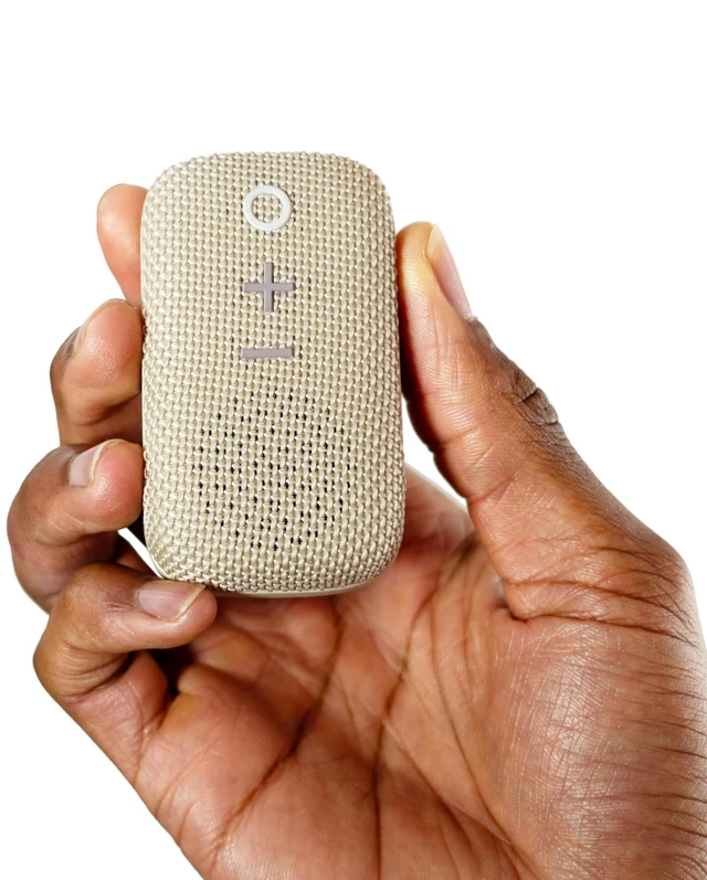 Main image of goSPKR Small Wearable Clip-on Bluetooth Speaker with IPX5 Water Resistance, Built-in Speakerphone with Microphone for Hands-Free Calls, Compact Design, Can Connect Up to 2 in Stereo (Beige)