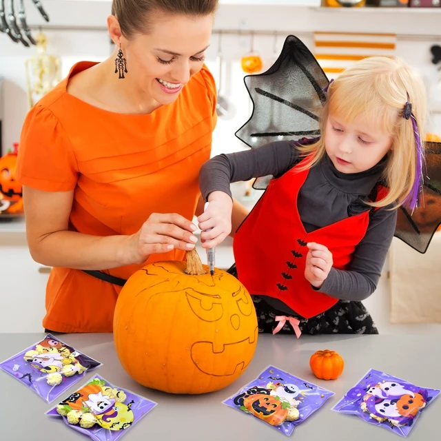 Alt view image 6 of 6 - Kreyfer 100 Pack Halloween Cellophane Treat Bags with Self Adhesive Seal Purple Ghost Pumpkin Candy Bags with 4 Assorted Designs for Halloween Party Favors, Trick or Treat and Candy Packaging