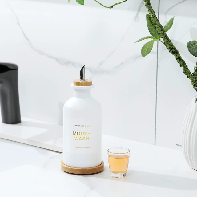 Alt view image 7 of 7 - 11.8OZ Mouthwash Dispenser for Bathroom, White | Bamboo & Stainless Steel Pour Spout, Mouthwash Cup Reusable, Bamboo Tray, Elegant Gold Label