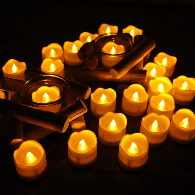 Alt view image 4 of 7 - Flameless Votive Candles with Remote Control,CR2450 Battery Operated Tea Light with Timer,Warm Yellow LED Candles for Christmas,Halloween,Home Decoration,Pack of 12
