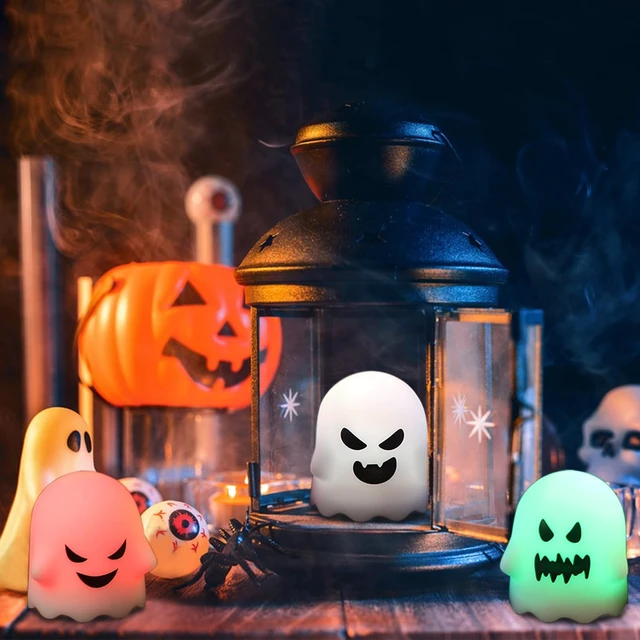 Alt view image 3 of 7 - Halloween Flameless Ghost Candles with Remote and Timer | Color Changing Battery Operated LED Tea Lights Candles for Halloween Home Horror Party Decoration(2 x 2.4 Inches)