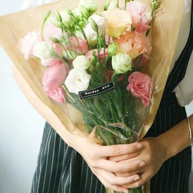 Alt view image 3 of 7 - Jutieuo 50 Pcs Flower Bags for Bouquet, Flower Wrapping Kraft Paper Floral Sleeve Bouquet Bags with Ribbons for Florist Supplies Wedding Birthday Mother's Day, 14x22 Inches