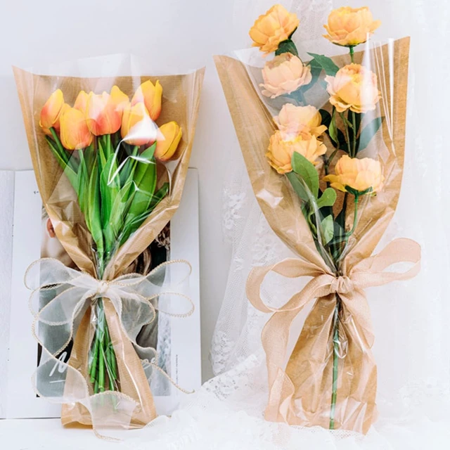 Alt view image 4 of 7 - Jutieuo 50 Pcs Flower Bags for Bouquet, Flower Wrapping Kraft Paper Floral Sleeve Bouquet Bags with Ribbons for Florist Supplies Wedding Birthday Mother's Day, 14x22 Inches