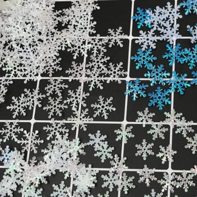 Alt view image 2 of 7 - 1200pcs Blue White Snowflake Confetti, Iridescent Winter Wonderland Decor