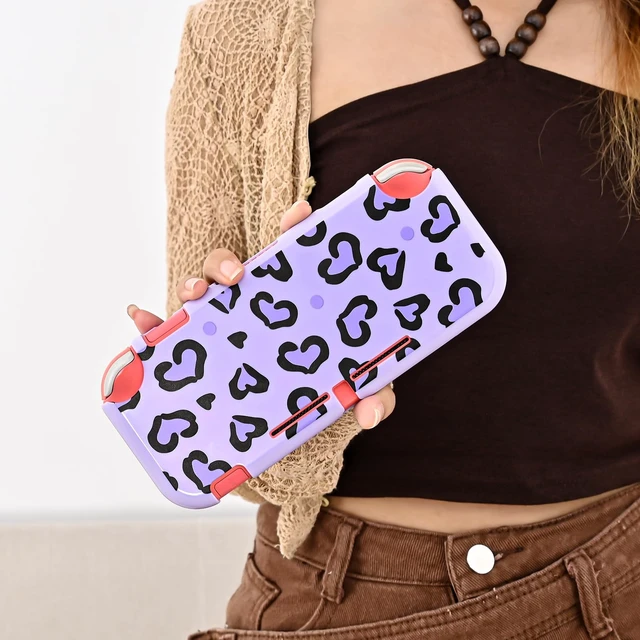 Alt view image 4 of 7 - Love Leopard Carrying Case for Switch Lite 2019 Accessories Set, Portable Carrying Case with 1 Hard PC Shell & 8 Slots & 1PCS Plush Heart Pendant & 4PCS Cat Paw Thumb Grips Caps- Purple