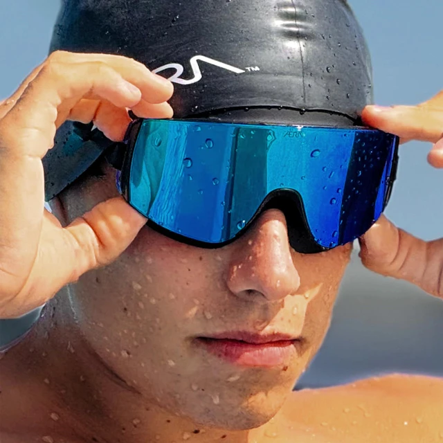 Alt view image 3 of 7 - Frameless Ultralight Blue Steel Swim Goggle Patent Pending, Anti-Fog Nanotech Lens, 100% UV Protection for Surf, SUP, Jet Ski, Kite, Waterski, Open Water
