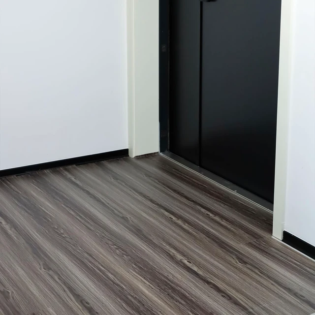 Alt view image 2 of 7 - Wood Grain Peel and Stick Floor Tiles, 11.8" W × 394" L, Dark Color Cover 32.29 Sq.ft, Soft woodlook finish, Long rolls reduce seams, Works on many surfaces, Helps protect floors, Waterproof