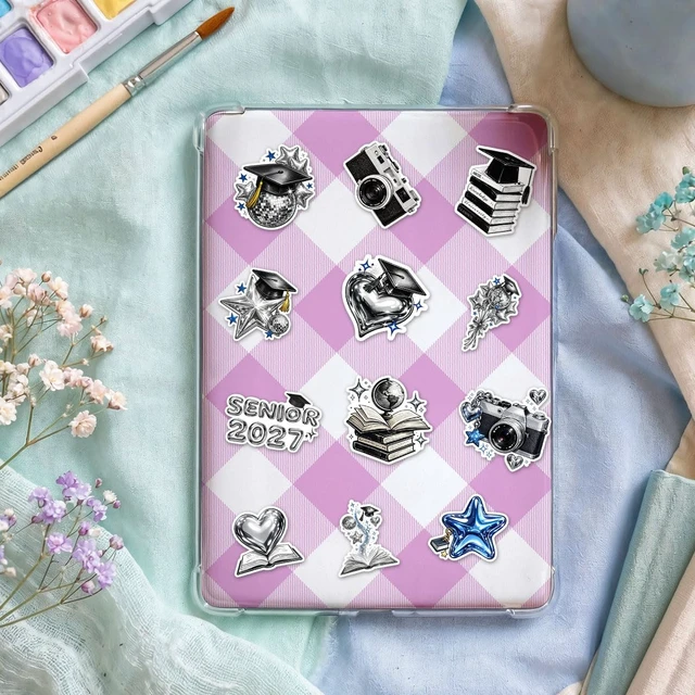 Alt view image 3 of 7 - 16pcs-3in Senior 2027 Stickers, Silver Graduation Pack Scarpbook Decoration, silver chrome look with black and blue accents, featuring caps, books, globes, hearts and stars