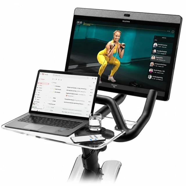 Main image of Peloton Accessories Laptop Desk Tray for Bike+ Phone Holder Clear acrylic desk tray for Peloton Bike+, Holds laptop, tablet & phone. No-scratch cushion tape included. Clips on easily