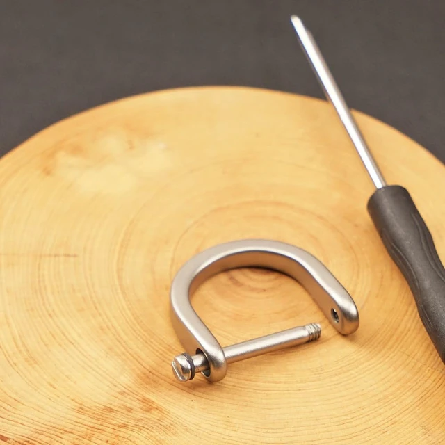 Alt view image 7 of 7 - Titanium Carabiner Clip,Multifunctional EDC Keychain with D Ring | This Keychain functions as a bottle opener, flathead screwdriver, Phillips screwdriver, wrench, and bicycle spoke wrench