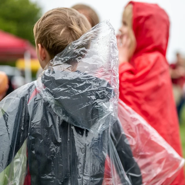 Alt view image 2 of 7 - Kids Disposable Rain Ponchos - Waterproof PE Plastic Travel Gear | 4 Assorted Colors 20 Pack 42 x 60 Inches