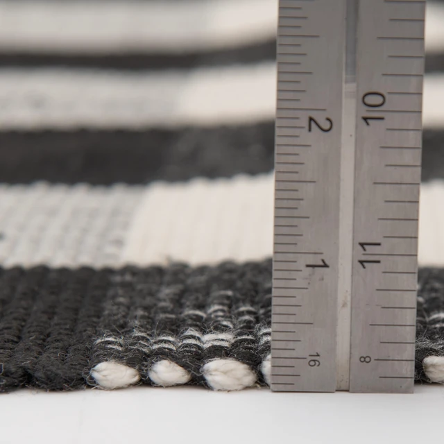 Alt view image 4 of 6 - Mainstays 24 in x 36 in Black and White Plaid Indoor/Outdoor Layering Rug