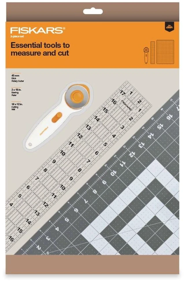 Main image of Fiskars 3-Piece Fabric Cutting Set: White Rotary Cutter, Gray Cutting Mat, and Acrylic Sewing Ruler