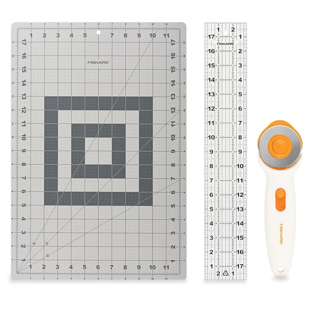 Alt view image 5 of 6 - Fiskars 3-Piece Fabric Cutting Set: White Rotary Cutter, Gray Cutting Mat, and Acrylic Sewing Ruler