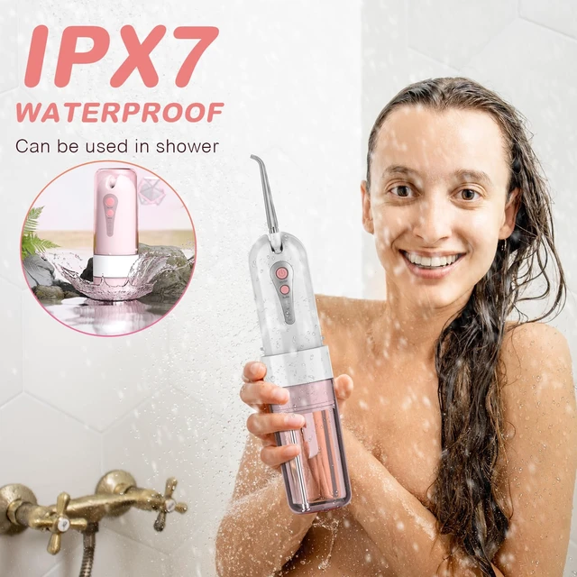 Alt view image 7 of 7 - Water Dental Flosser for Teeth Cleaning and Flossing with Travel Size Case Rechargeable Oral Irrigator, Portable Water Flosser for Adults, IPX7 Waterproof, 5 Jet Tips & 4 Modes, Pink