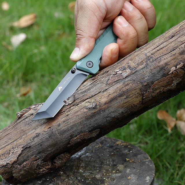 Alt view image 4 of 6 - Ozark Trail Shadow 7.5in Tanto Folding Knife, 3.25in Stainless Steel Blade with Titanium Coating, Green