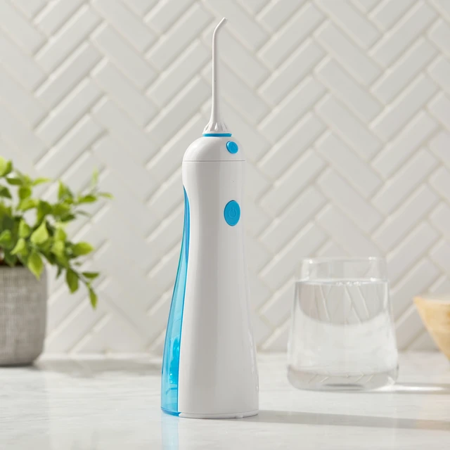 Alt view image 2 of 6 - Equate HydroClean Cordless Water Flosser with Removable Tank and 2 Pressure Cleaning Tips, White