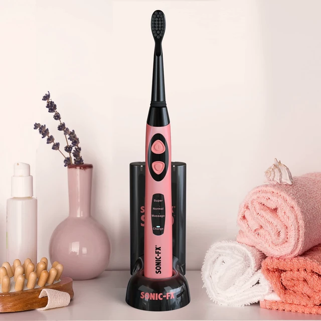 Alt view image 2 of 7 - Sonic-FX Solo Electric Toothbrush w/ 10 Brush Heads + 1 Interdental, Charcoal Bristles, Rechargeable, Charging/Storage Base, 3 Brush Modes, Smart Timer, 2 Months Use on Full Charge, Coral Color
