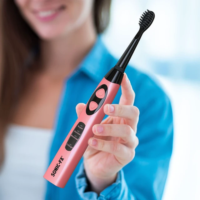 Alt view image 7 of 7 - Sonic-FX Solo Electric Toothbrush w/ 10 Brush Heads + 1 Interdental, Charcoal Bristles, Rechargeable, Charging/Storage Base, 3 Brush Modes, Smart Timer, 2 Months Use on Full Charge, Coral Color