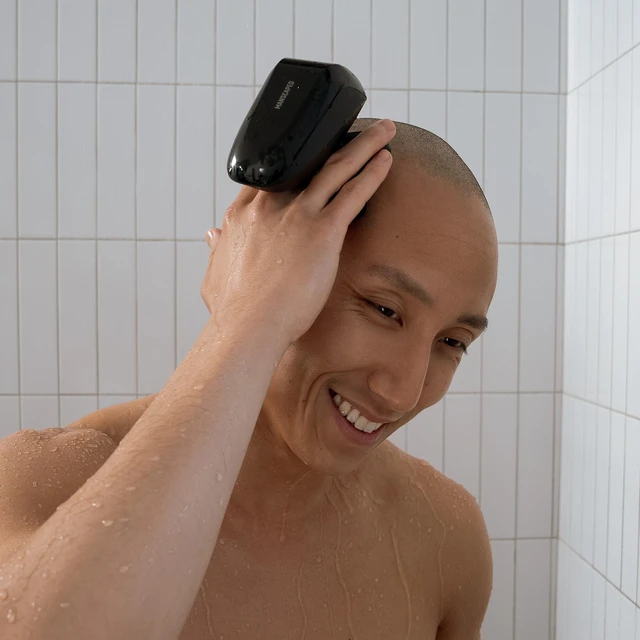 Alt view image 7 of 7 - MANSCAPED® The Dome Shaver PRO Head Shaver for Bald Men | Five Rotary Blade Design with SkinSafe® & FlexAdjust Technology, Wet/Dry, USB-C & Wireless Charging, Travel Lock Compatible