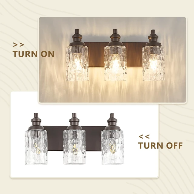 Alt view image 4 of 14 - FYNVEX 3-Light Bathroom Vanity Light Fixture Over Mirror, Oil-Rubbed Bronze | Clear Hammered Cylindrical Glass Shades, Metal Frame, Rippled Glow, Wall Mount Up or Down, E26 Socket, Hardwired, 120V