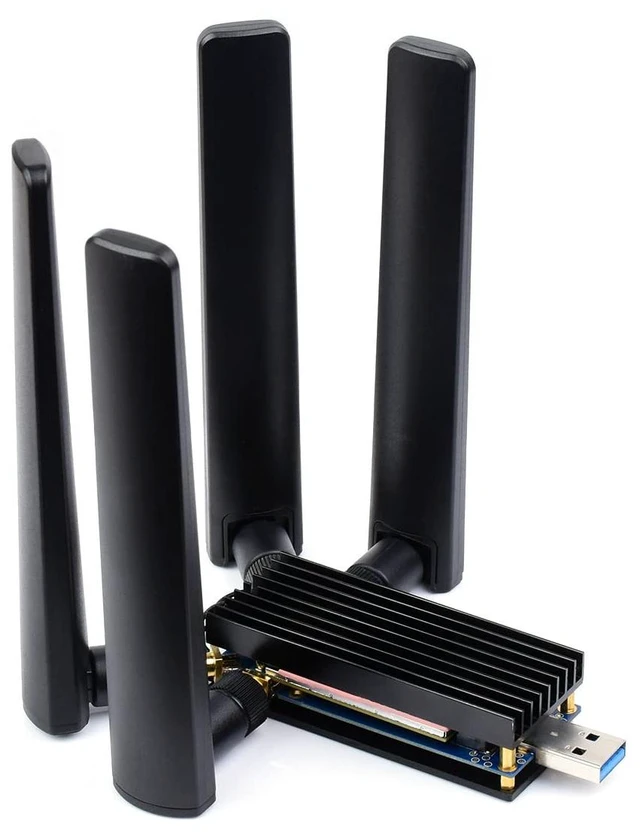 Main image of Waveshare 5G DONGLE Module Quad Antennas USB3.1 Port Aluminum Alloy Heatsink M.2 Key B Interface, 5G Module Not Included.
