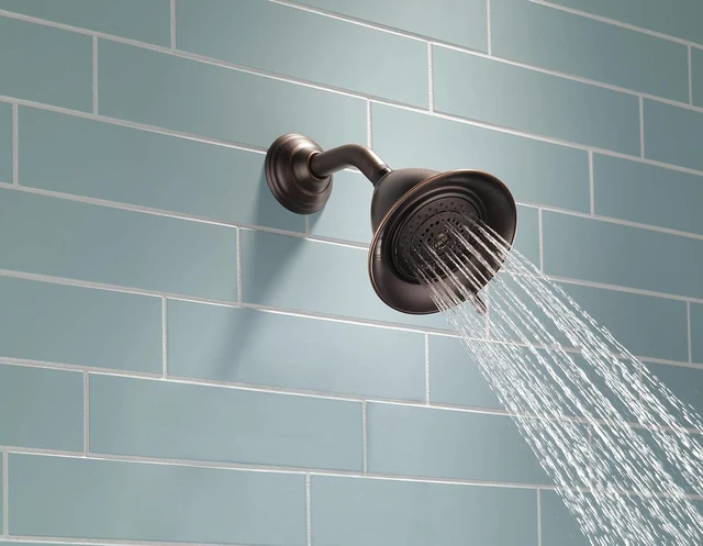 Alt view image 2 of 7 - Delta Faucet 3-Spray Touch-Clean Shower Head, Venetian Bronze RP34355RB