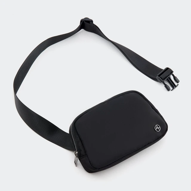 Alt view image 2 of 7 - Crossbody Belt Bag for Women and Men, Travel and Everyday Use, Black | Nylon belt bag with three mesh pockets, wide zipper opening and adjustable strap for crossbody or waist wear