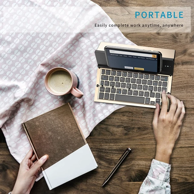 Alt view image 5 of 7 - Folding Bluetooth Keyboard, Wireless Foldable Keyboard with Portable Pocket Size, Aluminum Alloy Housing, Carrying Pouch, for iPad, iPhone, and More Tablets, and Smartphones(Gold)