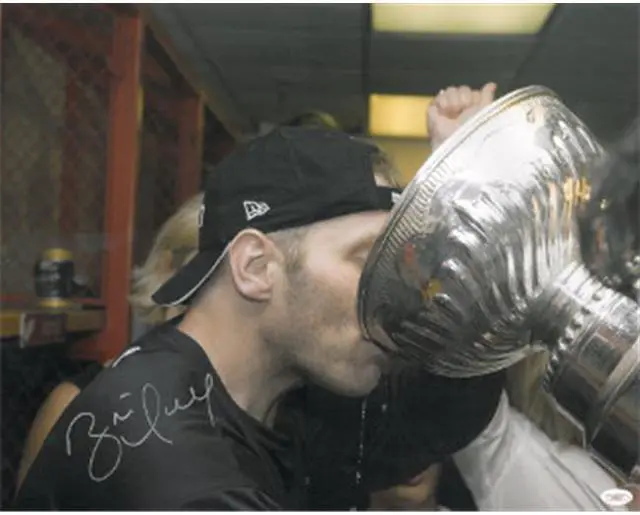 Main image of Brett Hull signed Detroit Red Wings 16x20 Photo (drinking from Stanley Cup)- JSA Hologram