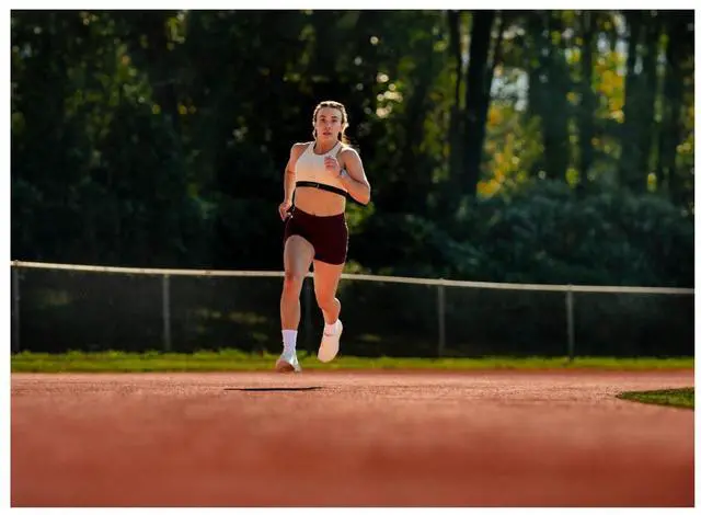 Alt view image 2 of 3 - Garmin® Forerunner® 970, Premium GPS Running and Triathlon Smartwatch, AMOLED Display, Built-in LED Flashlight, Titanium with Whitestone Case and Whitestone/Translucent Amp Yellow Band