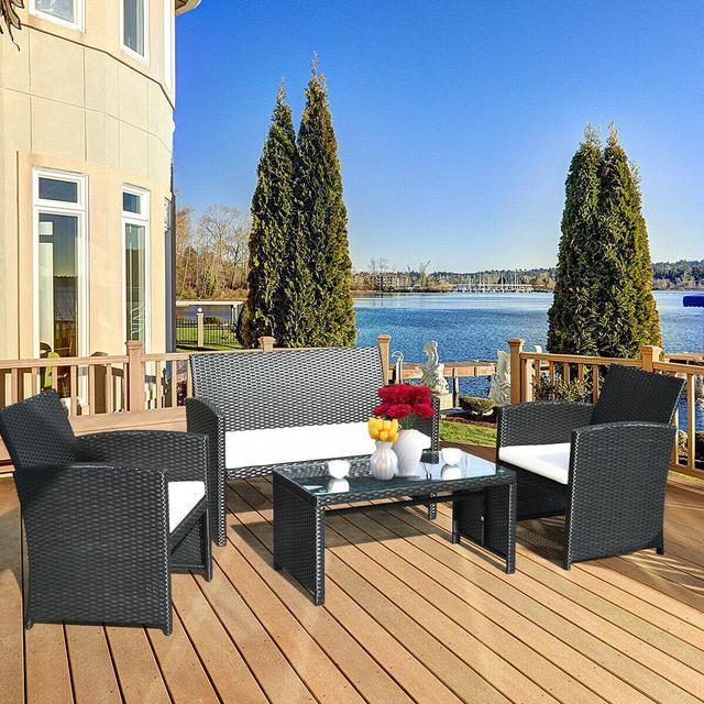 Main image of Goplus 4PCS Patio Rattan Furniture Conversation Set Cushioned Sofa Table Garden Black