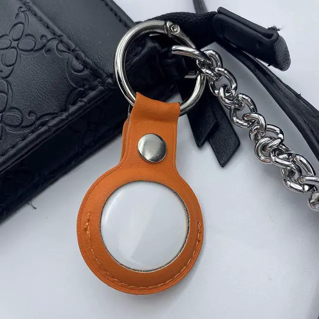 Alt view image 3 of 4 - AirTag Holder, Slim Lightweight Protective Cover with Keychain Carabiner for Apple AirTag 2021 (Short Leather Orange)