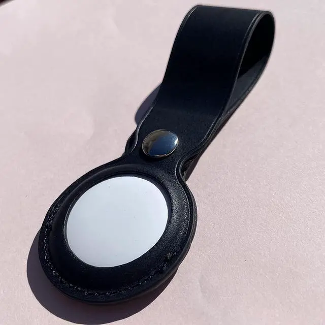 Alt view image 4 of 5 - AirTag Holder, Slim Lightweight Protective Cover with Keychain Carabiner for Apple AirTag 2021 (Long Leather Black)