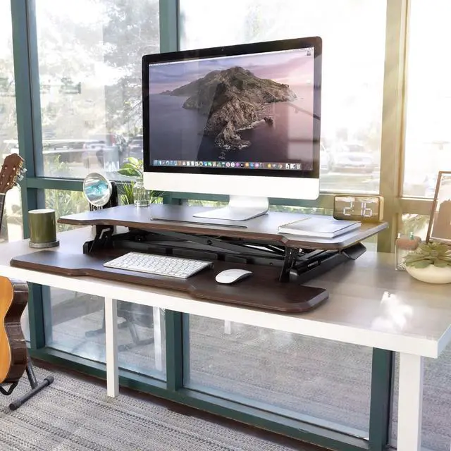 Alt view image 4 of 7 - Mount-It! Height Adjustable Stand Up Desk Converter, 38 Wide Tabletop Standing Desk Riser with Gas Spring Desktop Standing Desk with Keyboard Tray Fits Two Monitors, Dark Walnut