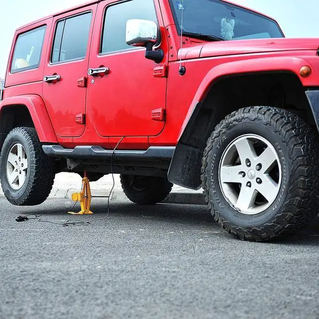 Alt view image 7 of 7 - Car Jack 2 Ton 12V Electric Scissor Jack with Storage Box for Car SUV Tire Changes (Lifting rang: 4.72~14.57 inch)