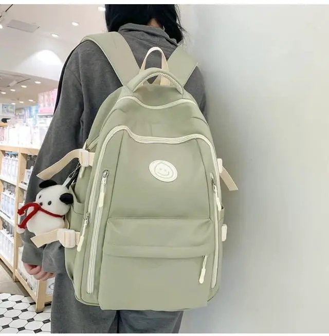 Alt view image 2 of 5 - MININAI Preppy Backpack with Cute Pendant Women Smile Face Laptop Backpack Kawaii Lightweight Aesthetic College Backpack (Sage Green,One Size)