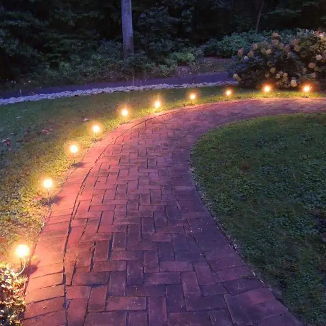 Alt view image 6 of 7 - SUNSGNE C7 Christmas Lights, 25Ft Outdoor Christmas String Lights with 27 Clear Warm White Incandescent Bulbs, Xmas Vintage String Light for Patio, Cafe, Party Decor, Green Wire