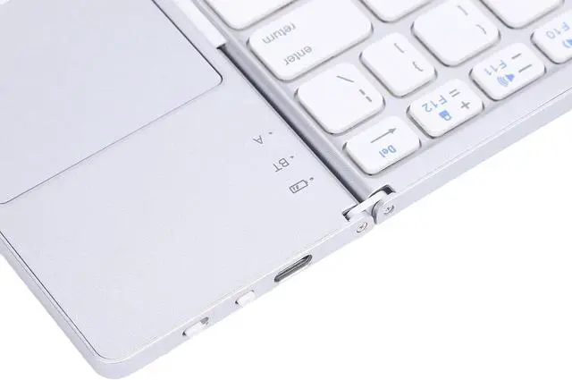Alt view image 5 of 7 - Portable Folding Keyboard, BT 5.0 Portable Triple Folding Rechargeable Keyboard with Touchpad Rechargeable Ultra Slim Foldable BT Keyboard for, Tablet, Laptop, PC (Silver+White)