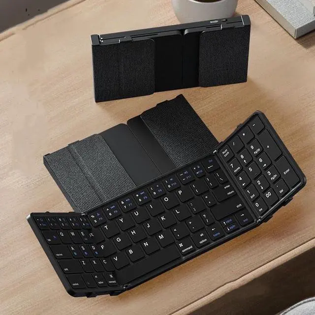 Alt view image 2 of 7 - Yunir Foldable Compact Keyboard,Portable Bluetooth Keyboard with PU Leather Cover,Pocket Sized Wireless Travel Keyboards for Tablet Smartphone Laptop PC Wins iOS Android