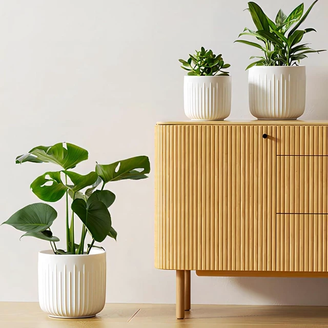 Main image of LE TAUCI Ceramic Planters, 8.3/7/6 Inch Indoor Pots for Plants with Drainage Holes & Mesh, Modern Matte Glaze Cylinder Fluted Plant Pot for Snake Plant, Set of 3, White