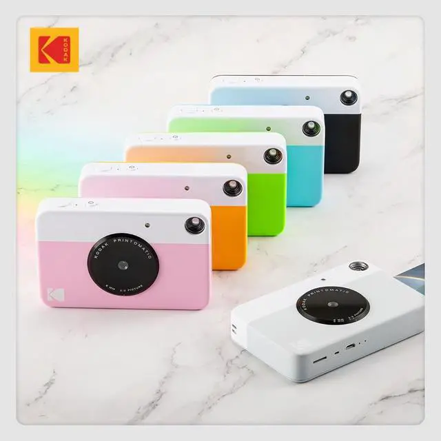 Alt view image 7 of 7 - Kodak Printomatic Instant Camera (Grey) Gift Bundle + Zink Paper (20 Sheets) + Deluxe Case + 7 Fun Sticker Sets + Twin Tip Markers + Photo Album.