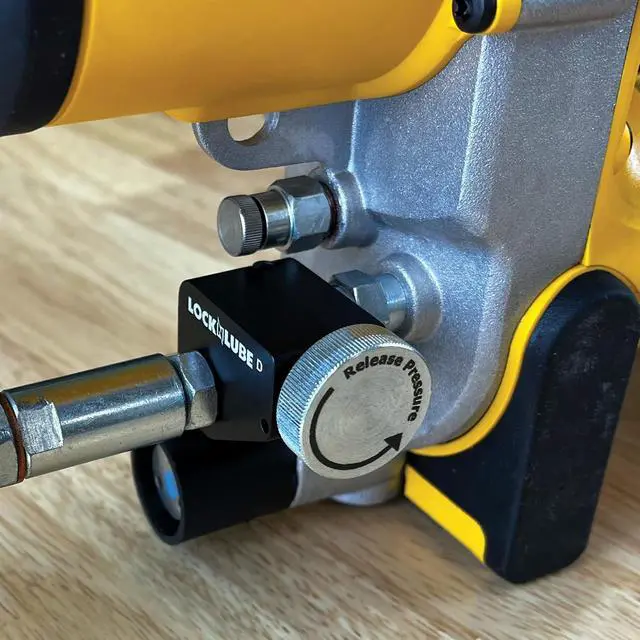 Alt view image 2 of 4 - Pressure Return Valve for Use with Cordless Grease Guns. No More Pressure Locks! Returns Grease to The Tube. Releases Hose backpressure.