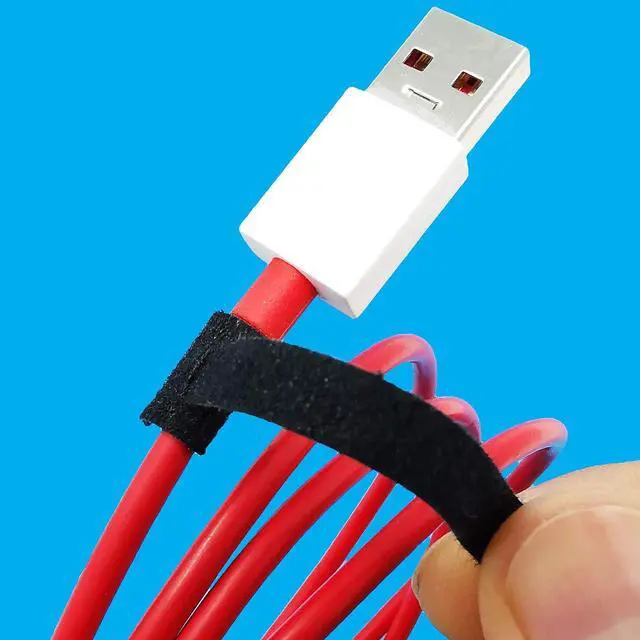 Main image of RIP-TIE Mini 1/4" x 3-1/2" Cable Tie Perfect for USB Cable, Earbud Cords, Cell Phone Cord 56 Pack Black