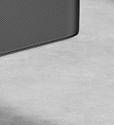 a close up of a metal table with a black base