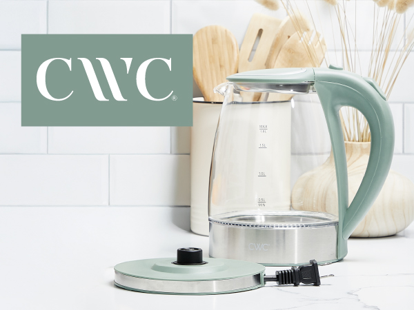 Electric glass tea kettle with stainless steel base and ergonomic handle.